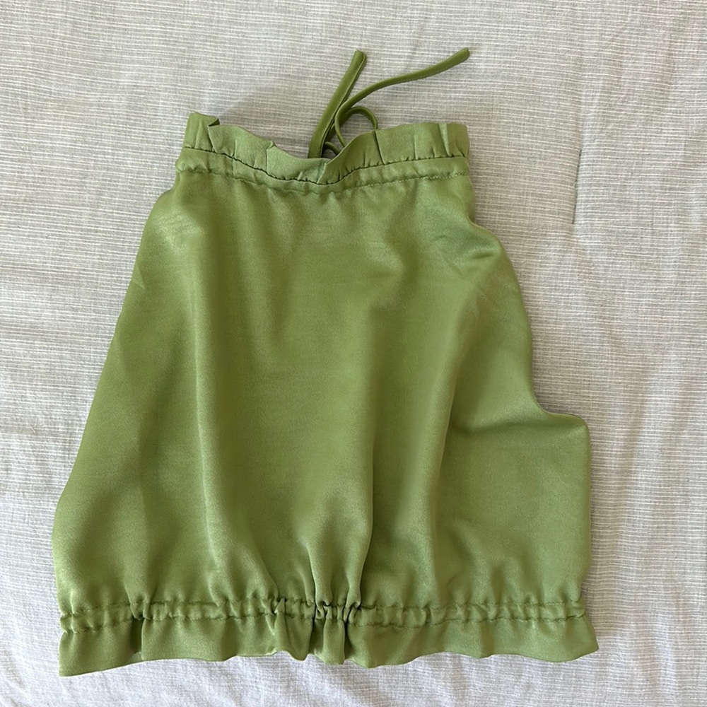 Shein crop top ties behind neck and also around mid drift.